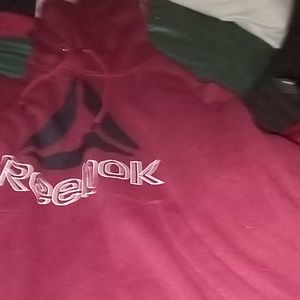 Like New Reebok red and black hoodie with middle pocket.Size Large.retail $28
